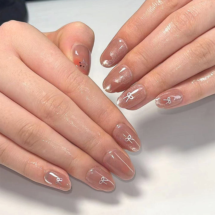 Artificial nail extensions with cute bunny design and hearts Kalsten