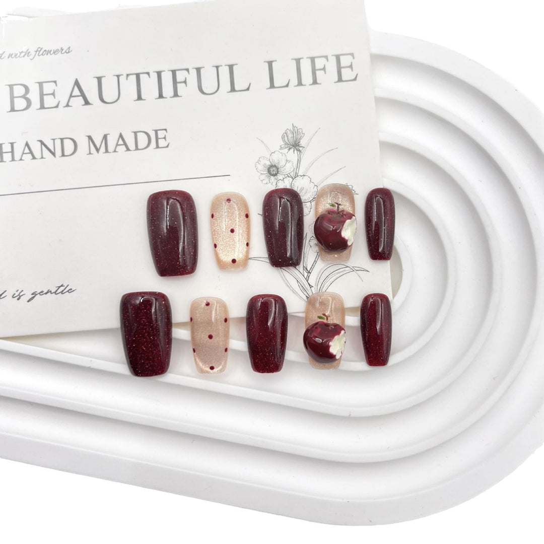 Artistic Press-On Nail Art Set with Creative Apple and Polka Dot Designs