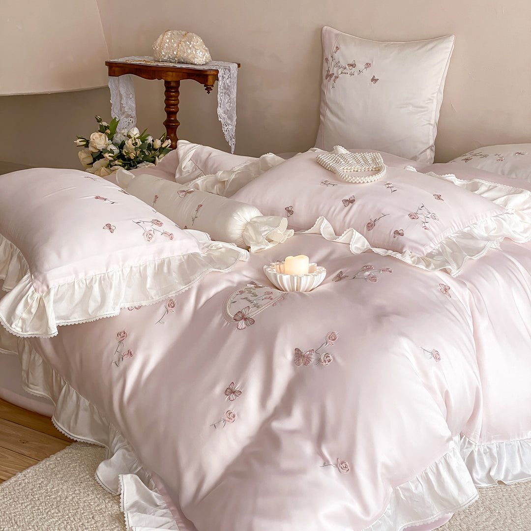 Satin bedding set with luxurious cotton satin quality, embroidered butterflies and roses, and ruffle