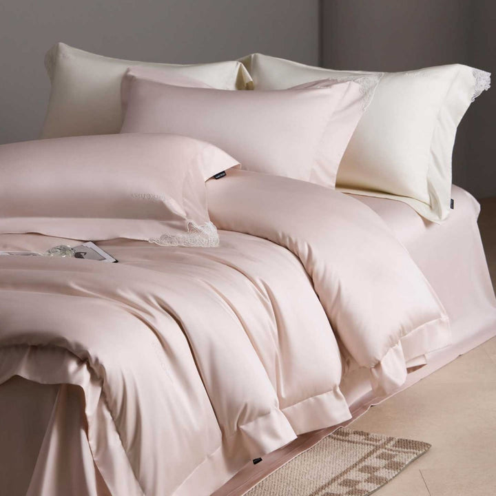 Luxurious cotton satin bedding set with delicate lace trim and hotel finish