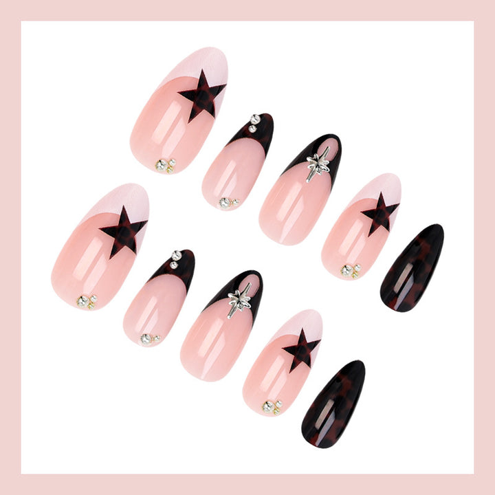 Acrylic nail set with creative star patterns and glitter accents Kalsten