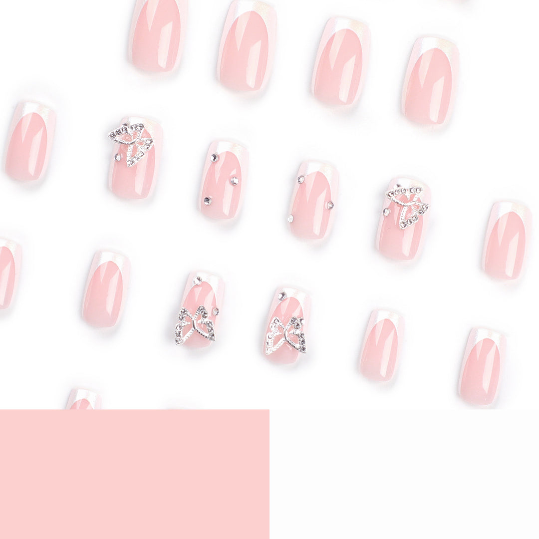 Elegant Nail Art with Glitter and Floral Accents Kalsten