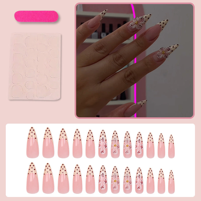 Art nail set with elegant flower and dot designs Kalsten
