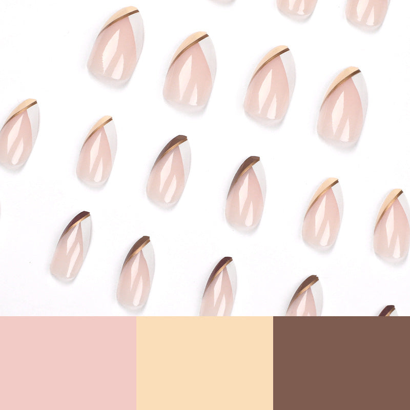 Artful nail art in elegant stiletto design with golden accents Kalsten