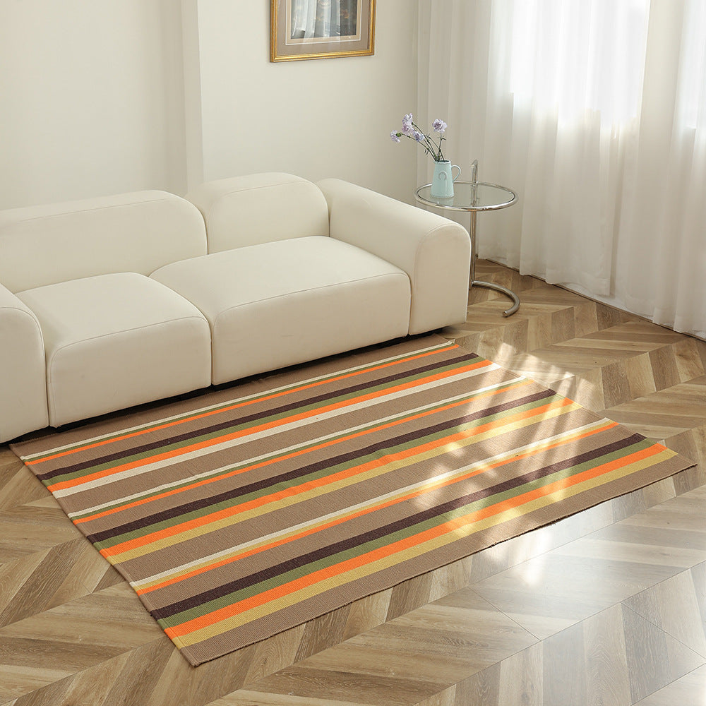 Flat-woven striped living room rug with low pile and non-slip backing