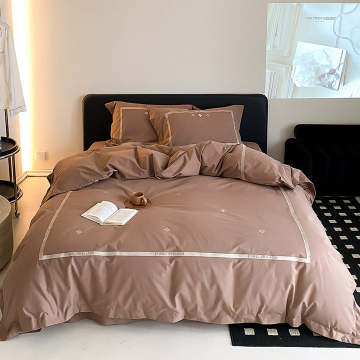 Luxurious cotton satin bedding set with embroidered border edge