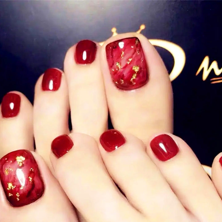 Artistic Nail Art with Gold Accents