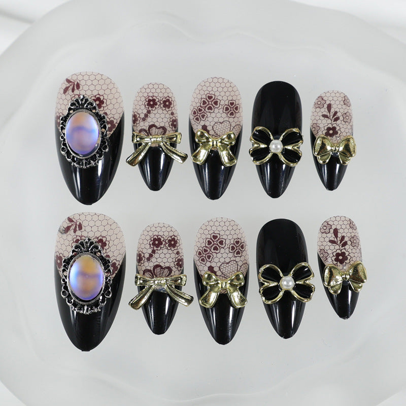 Artificial nail set with elegant dot and bow decorations Kalsten