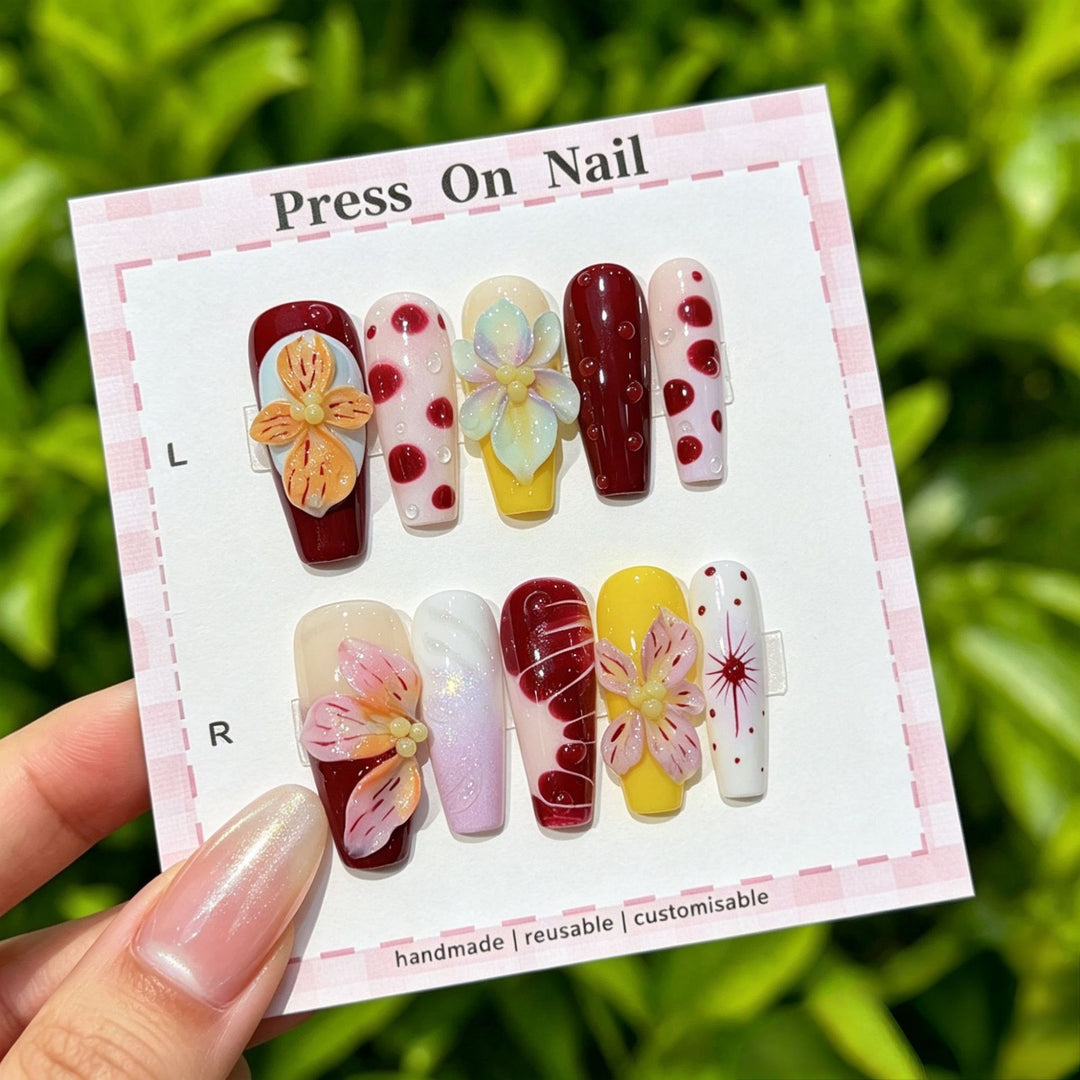 Artistic Press-On Nail Set with Floral and Patterned Designs