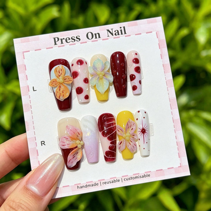 Artistic Press-On Nail Set with Floral and Patterned Designs