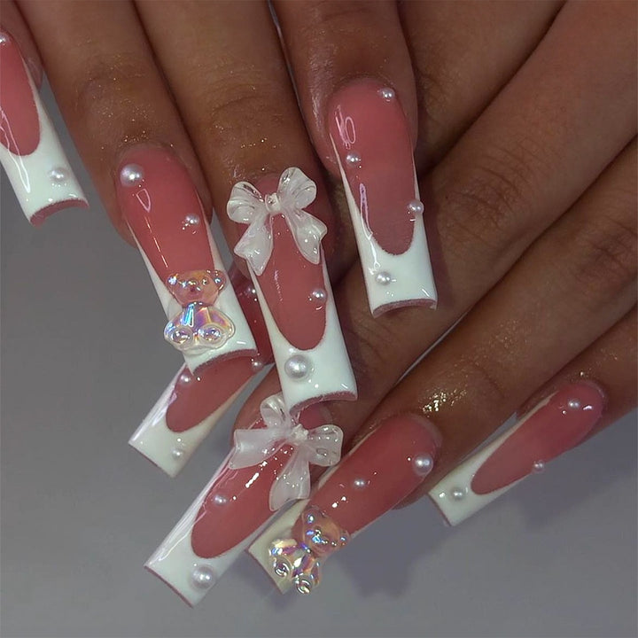 Creative acrylic nail set with delicate pearl and gloss accents Kalsten
