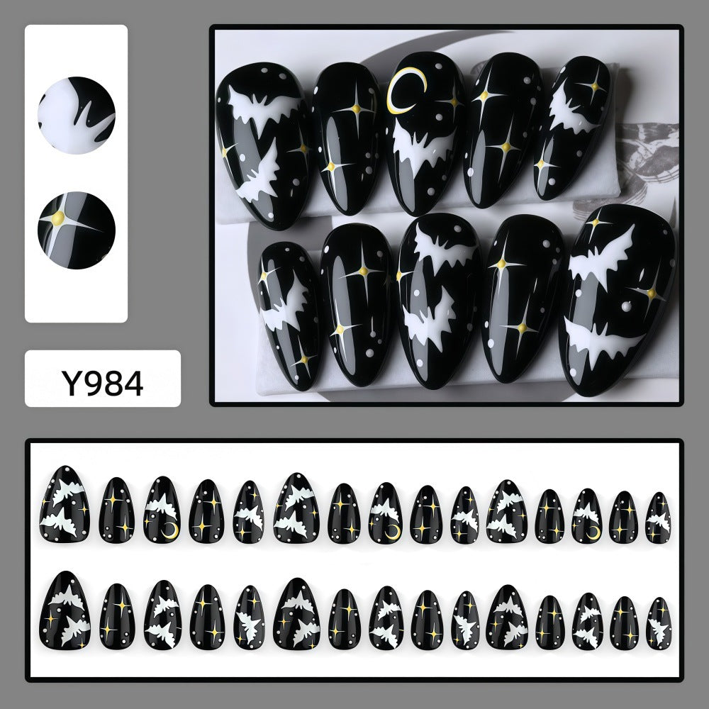Artificial nails in creative Halloween bat design Kalsten