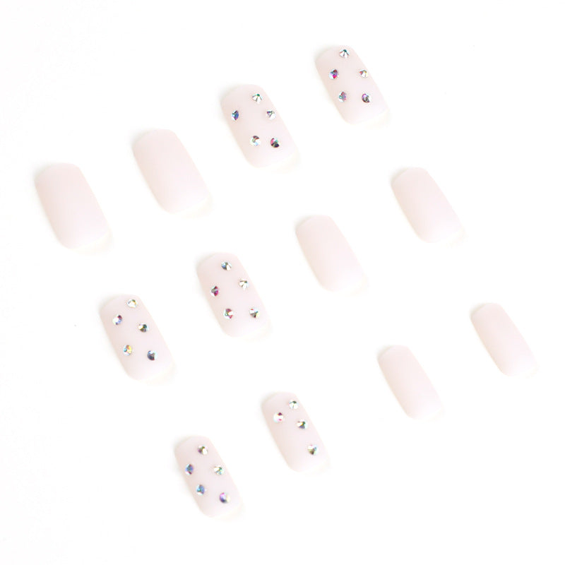 Artistic nail art with elegant rhinestone embellishments Kalsten