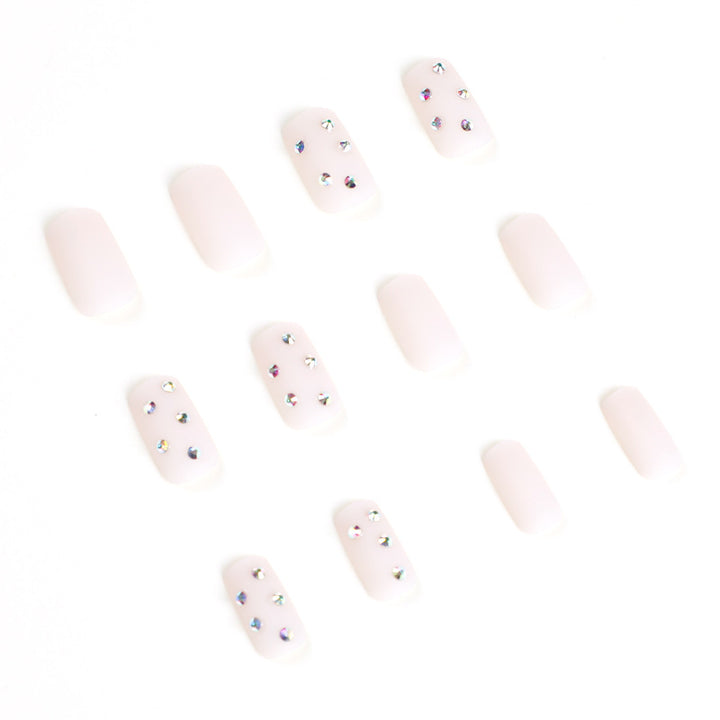 Artistic nail art with elegant rhinestone embellishments Kalsten