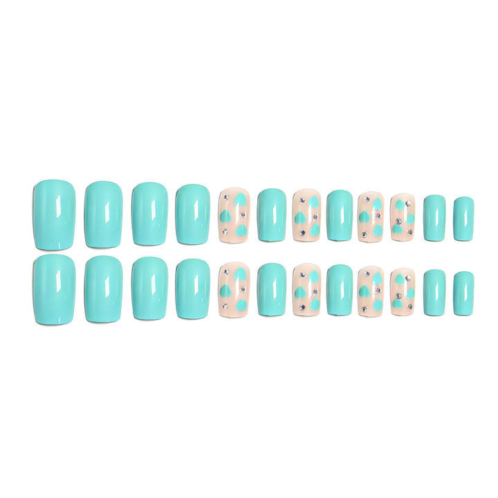 Nail art with heart designs and glitter accents Kalsten