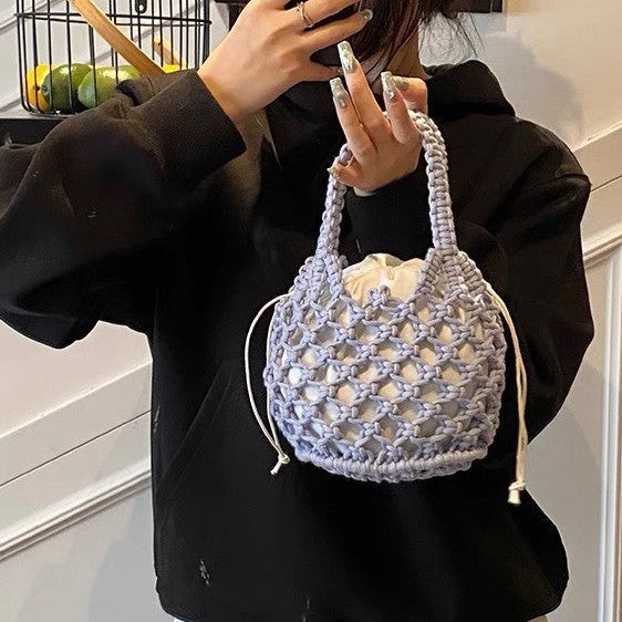 Fashionable handbag made of braided material Kalsten