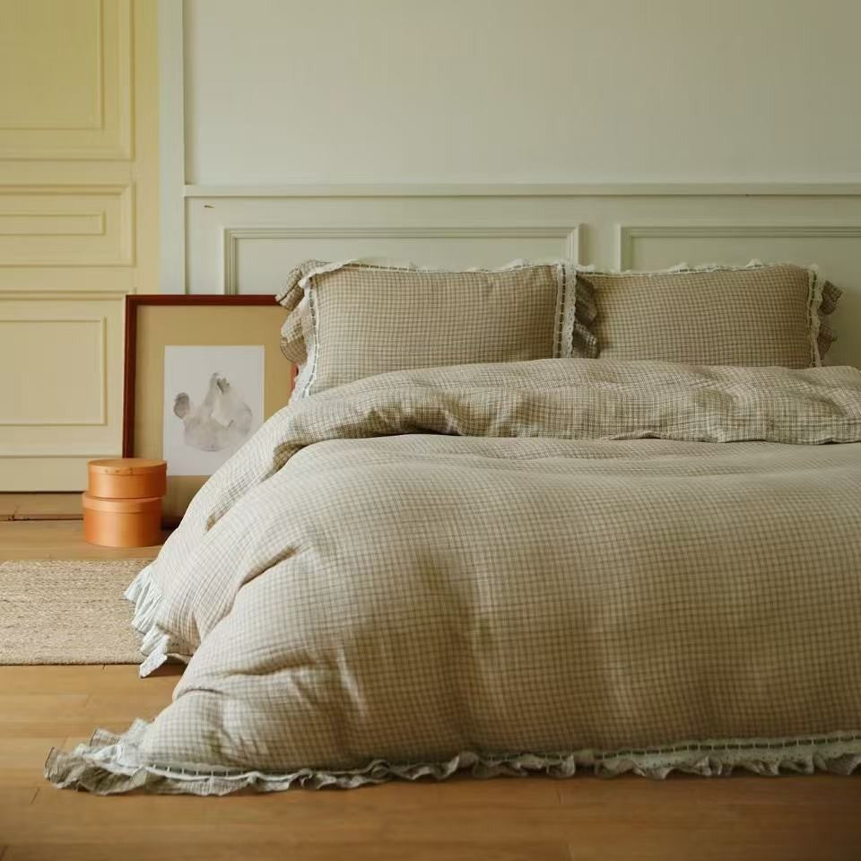 Luxurious bed linen set made of cotton gauze with quilted blanket and lace trim