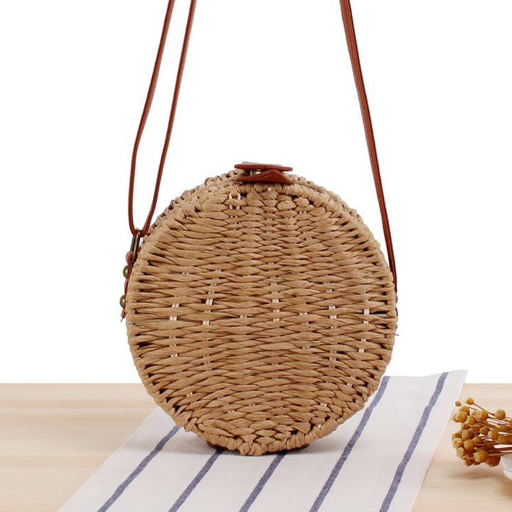Round basket bag with leather accents Kalsten