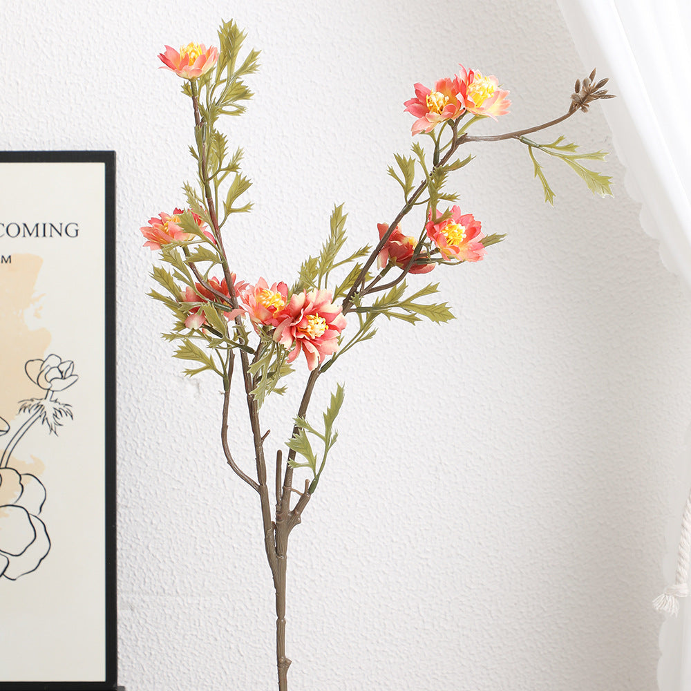 Elegant artificial flower branch with detail-loving blossoms