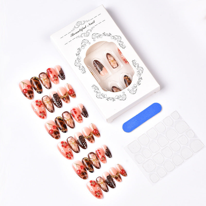 High-quality artificial nail creation with floral decorations Kalsten
