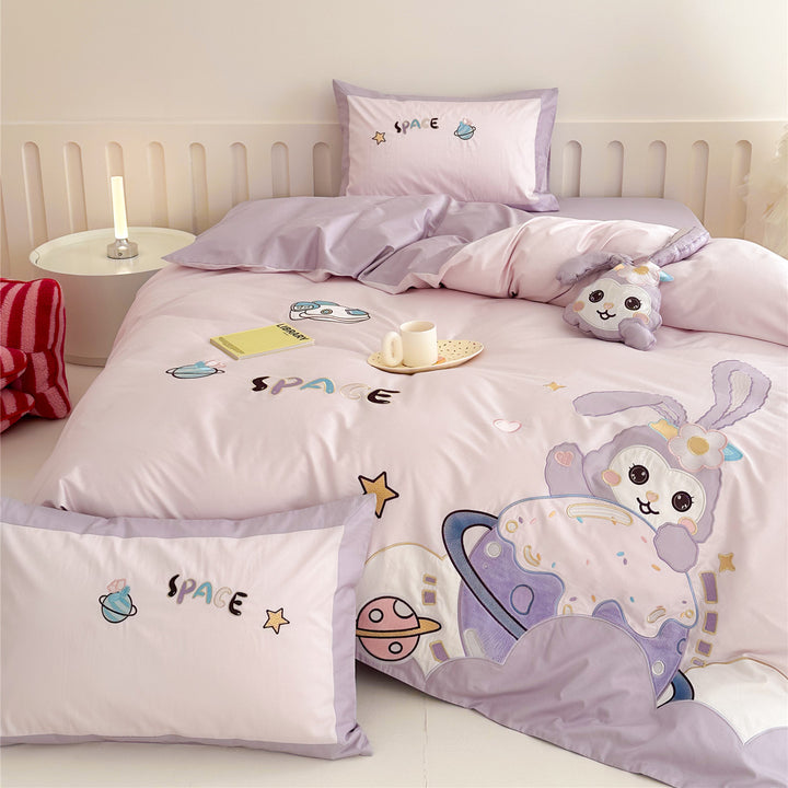 Children's bedding set with playful space bunny design