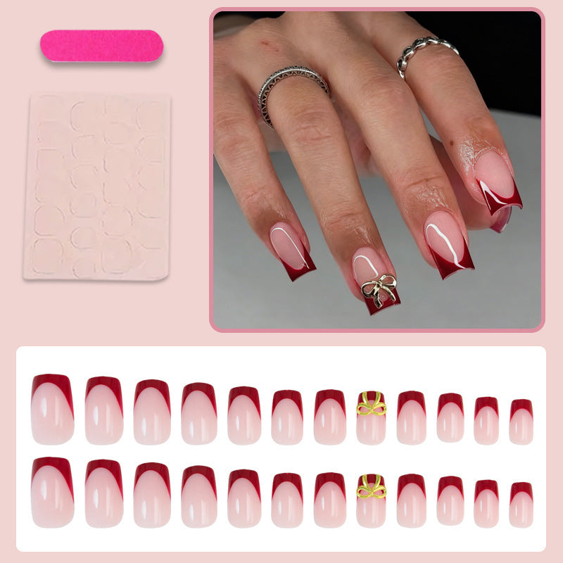 Artificial nail set with elegant red tips and refined bow decorations Kalsten