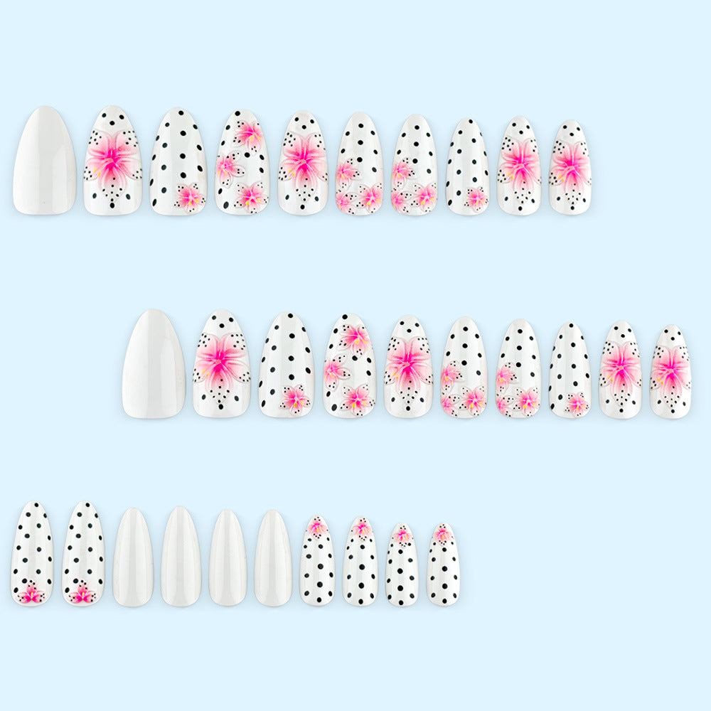 Artificial nail set with floral accents and polka dots Kalsten