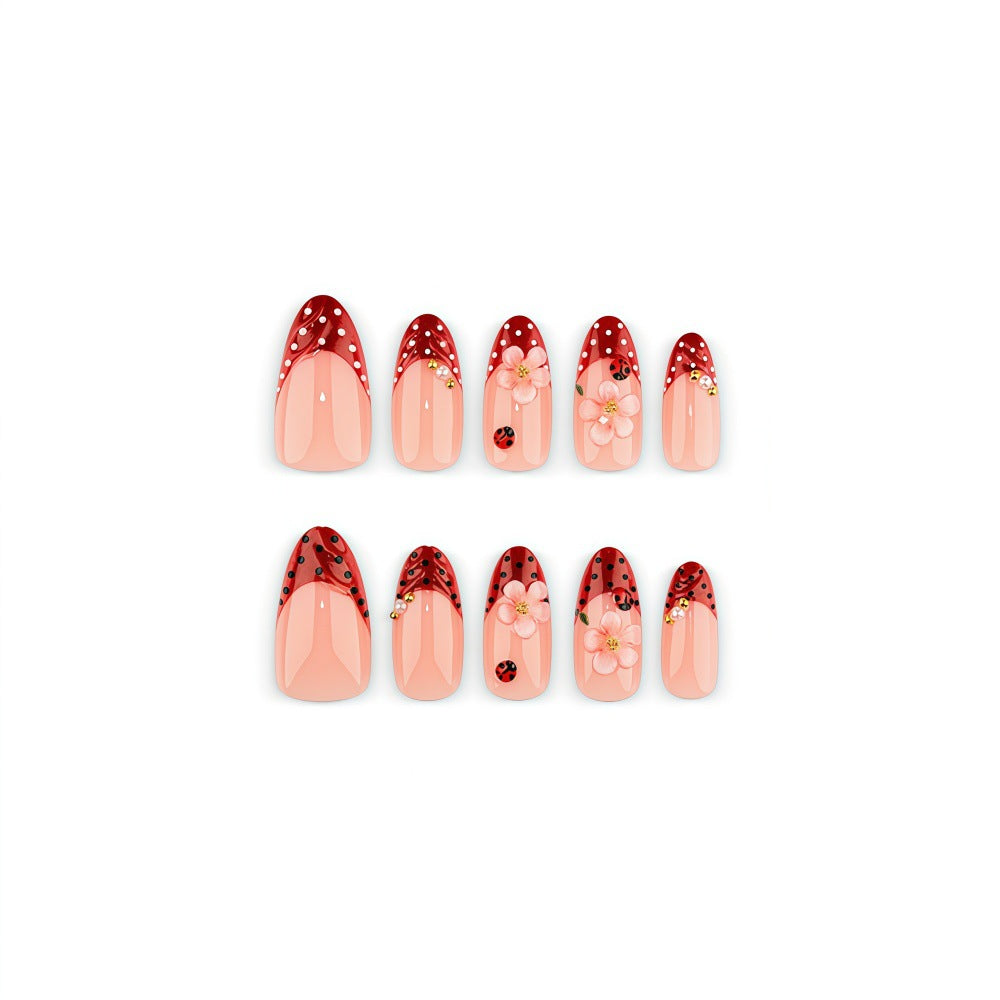 Artificial nails with floral design and 3D accents Kalsten