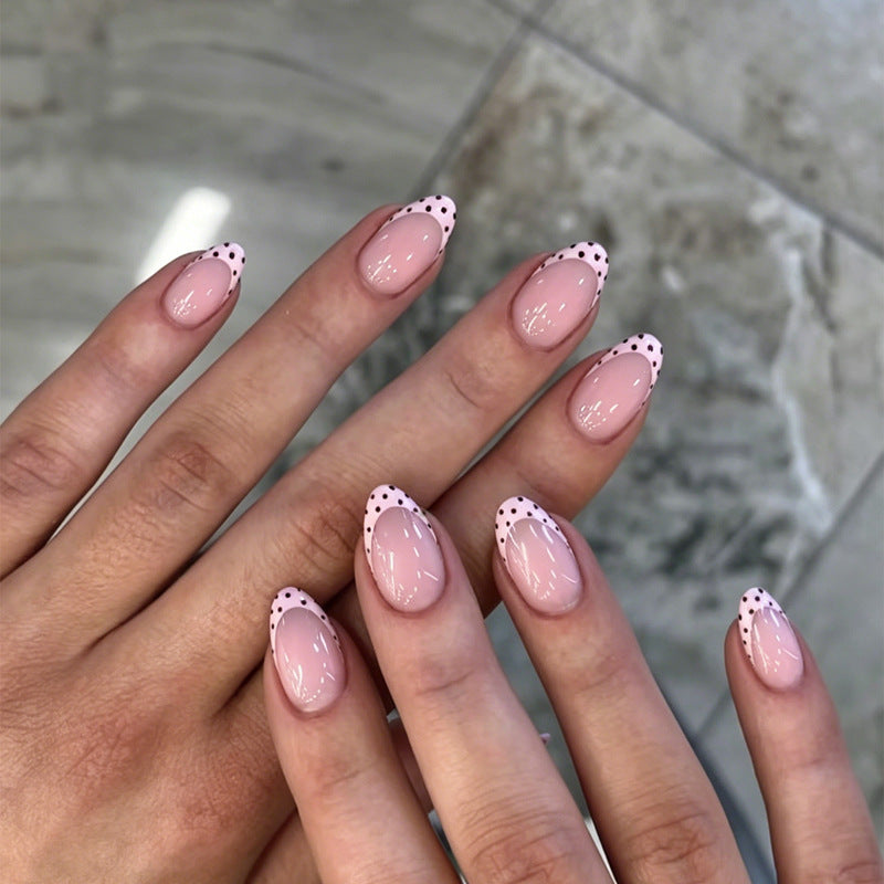 Artificial nail set with elegant tips and playful dots Kalsten