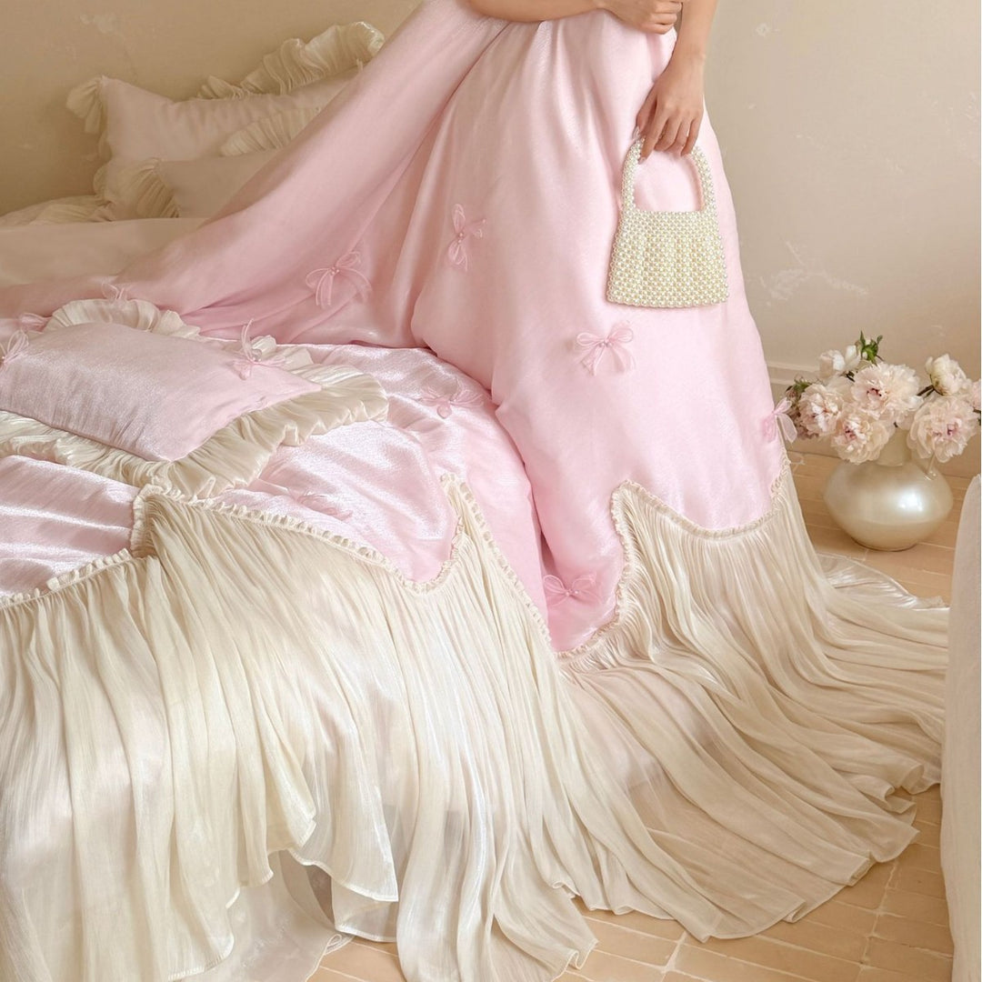 Luxurious satin bedding set with ruffles, pleated bed skirt and decorative pillow