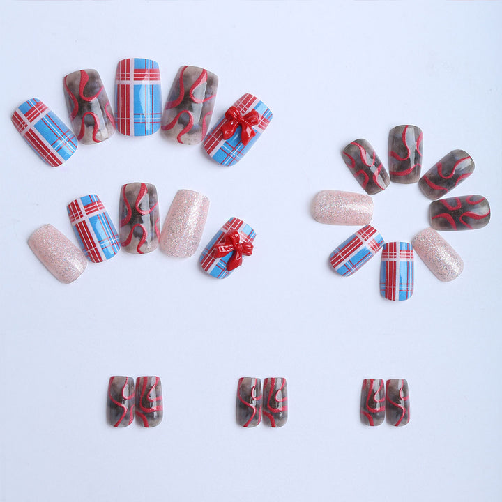 Artificial nails with festive gift design and glitter Kalsten