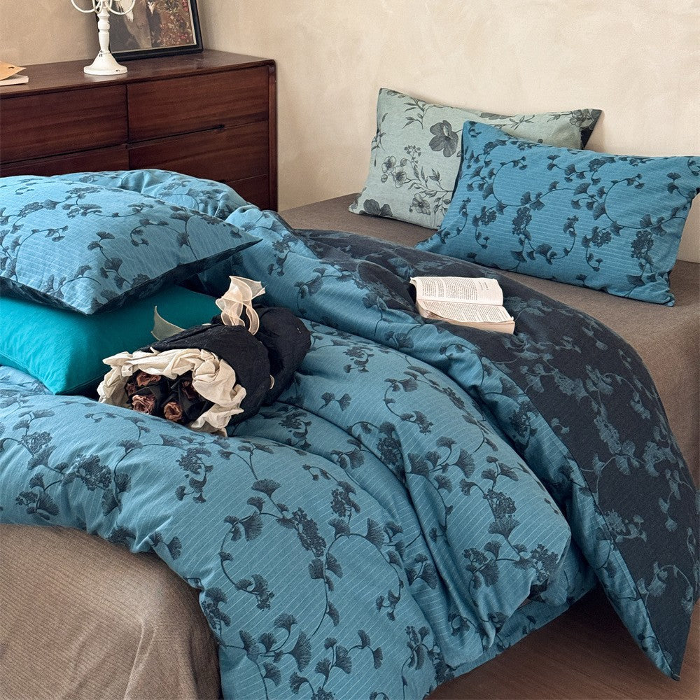 Premium cotton bedding set with floral all-over woven texture and light quilting