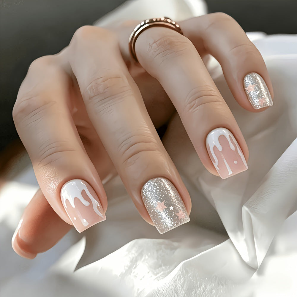 Glittering artificial nails with playful drop design Kalsten