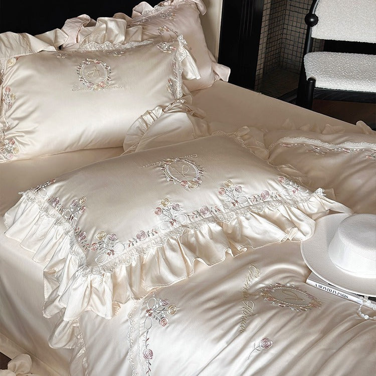 Luxurious satin bedding set with fine floral embroidery and ruffles