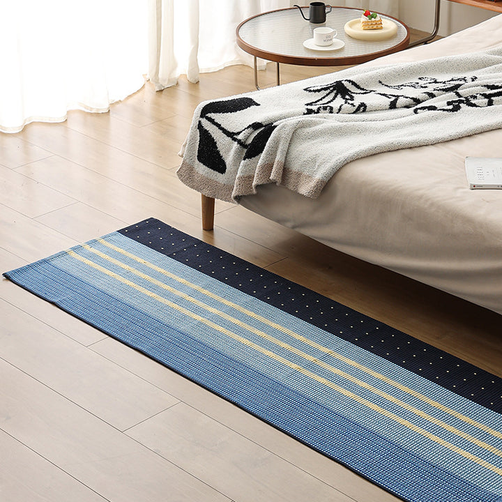 Flat runner rug made of cotton blend with checked woven structure