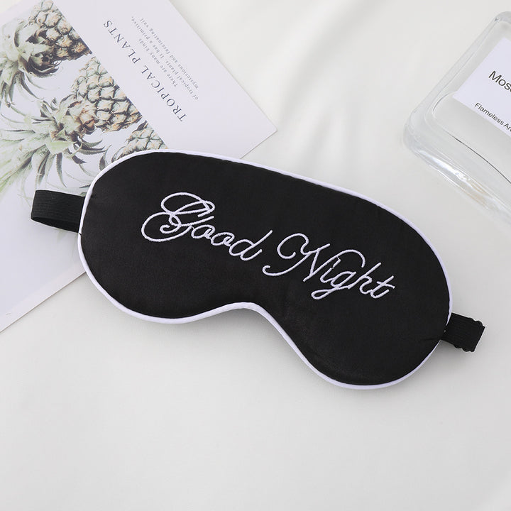 Unisex embroidered contoured sleep mask with decorative text embroidery and adjustable elastic band Kalsten