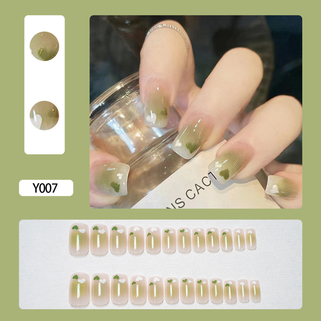 Artistic Press-On Nail Set with Heart and Leaf Designs
