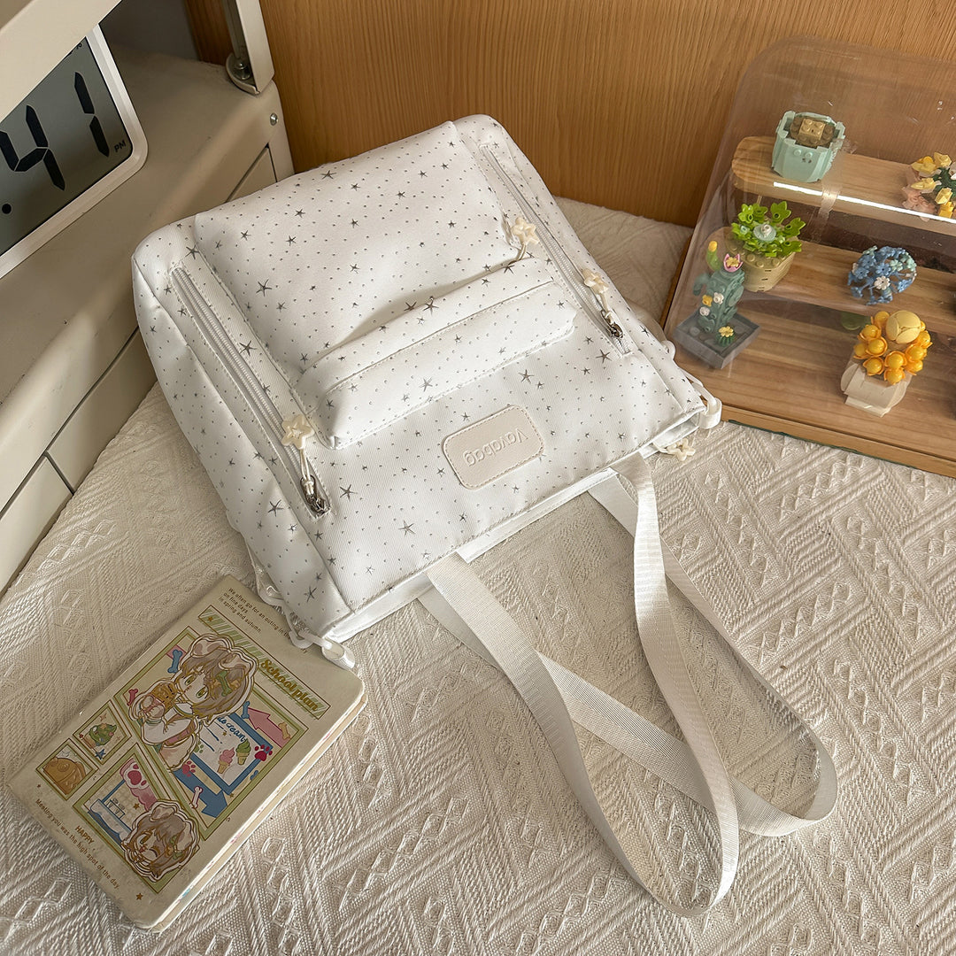 Stylish Multi-Compartment Backpack with Decorative Accents Kalsten