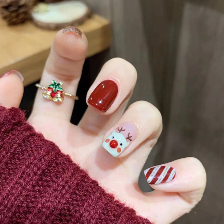 Artificial nail design with festive Christmas motif Kalsten