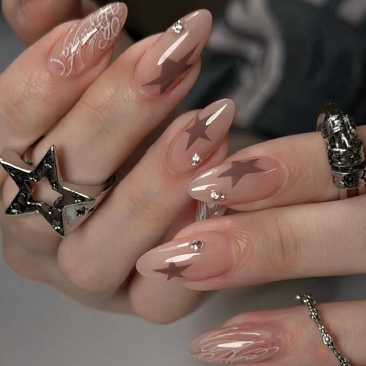 Acrylic nail set with elegant star and glitter details Kalsten