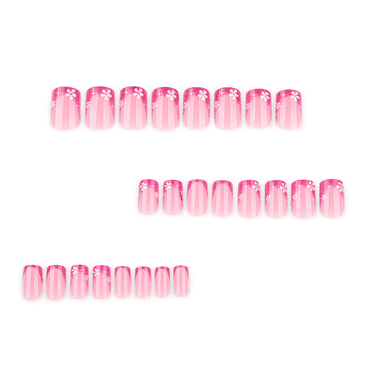 Artistic nail art with floral accent and glitter Kalsten