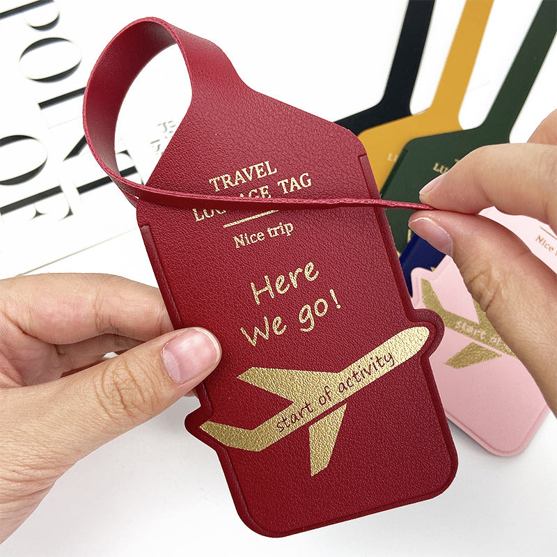 premium leather travel luggage ID tag with embossed airplane motif and adjustable strap Kalsten