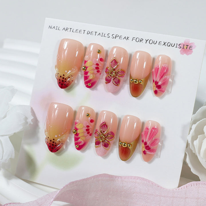 Artificial nail set with floral accents and sparkling details Kalsten