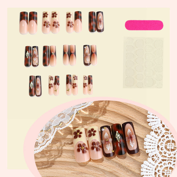 Nail set with floral accents and glitter accents Kalsten