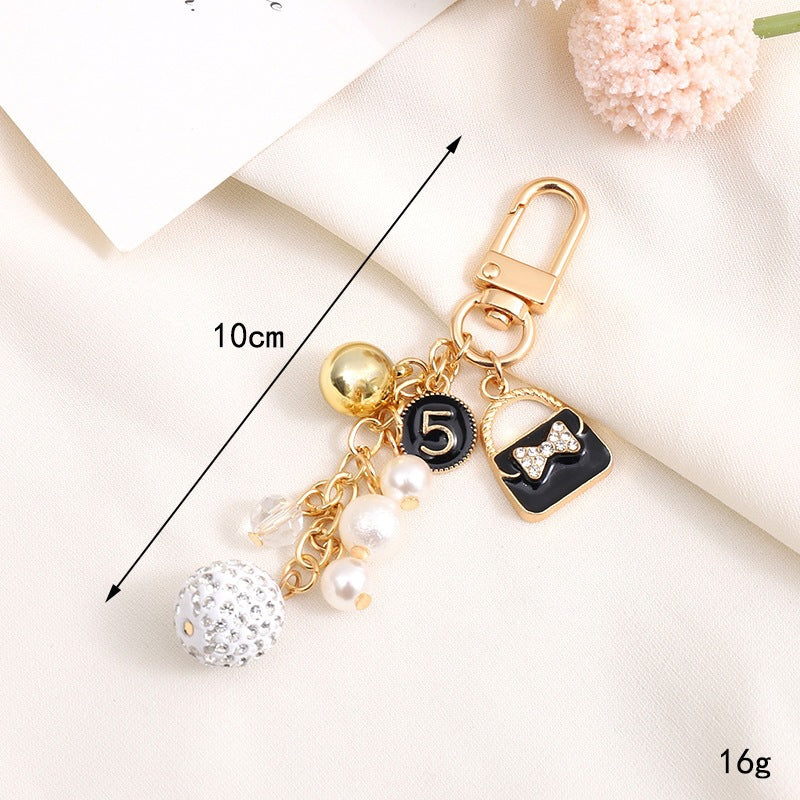 Playful keychain with teddy bear motif Kalsten