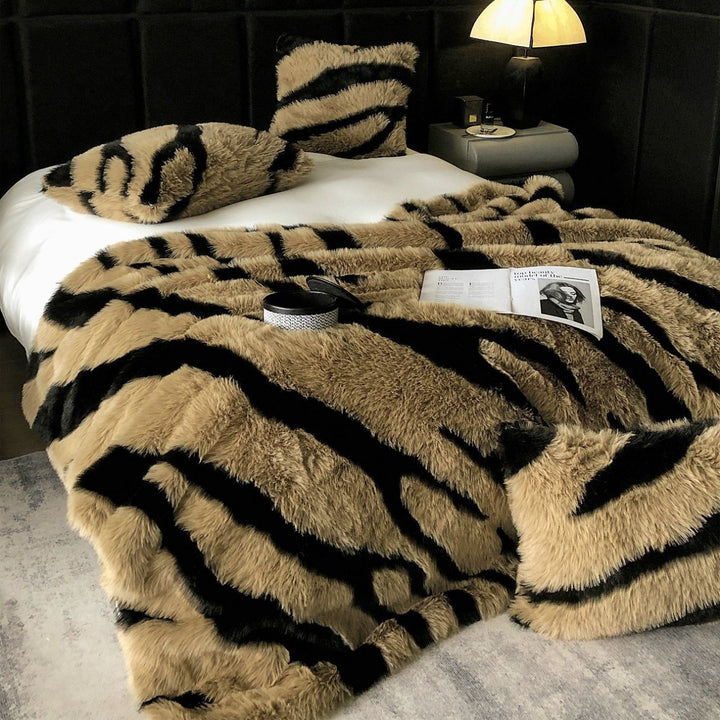 Faux fur bedspread with zebra design and extra fluffy texture
