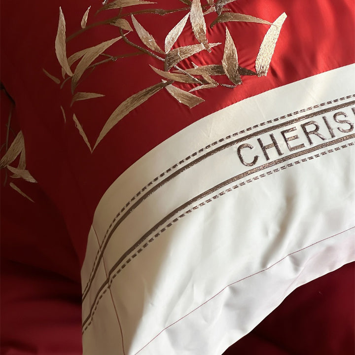 Duvet cover set made of cotton satin with embroidered bamboo motif, fine border & decorative roll cover