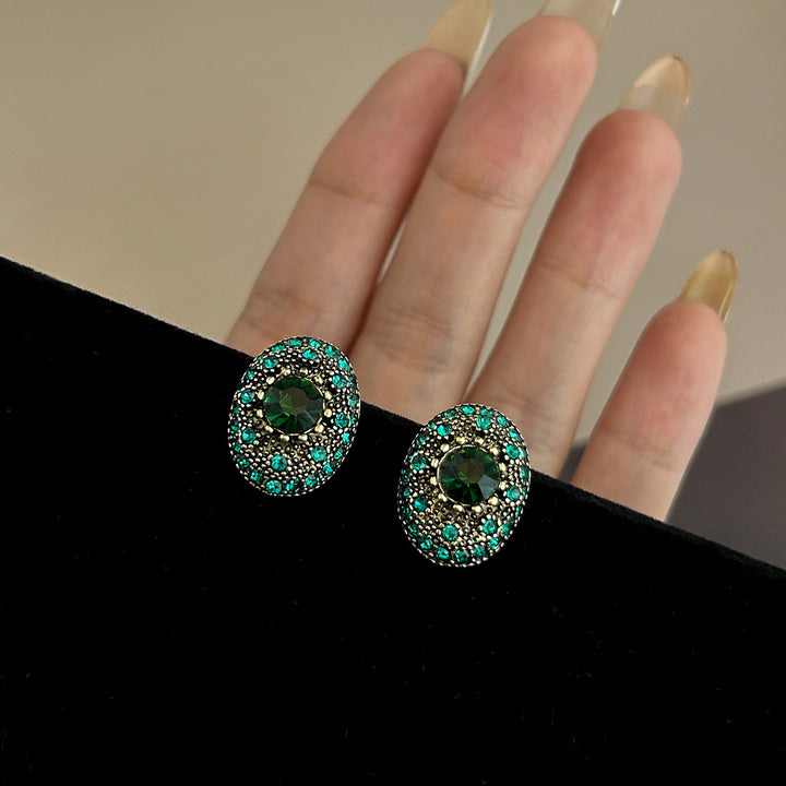 Sparkling stud earrings with intricate details Kalsten