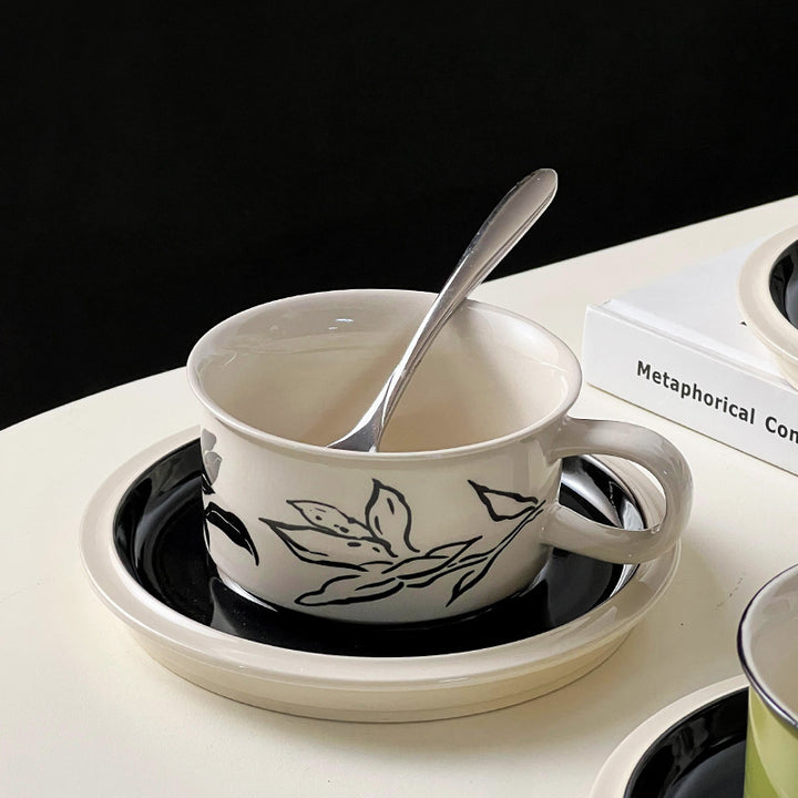 Ceramic cup set with saucer and modern floral print