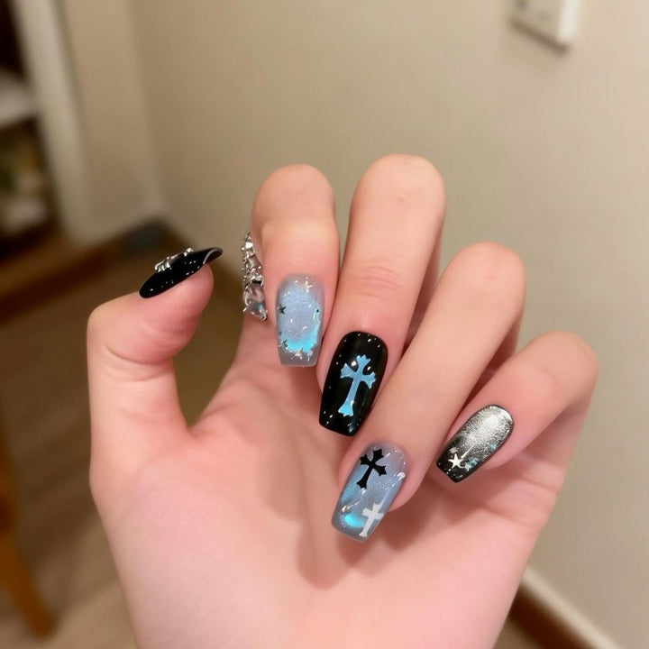 Artistic Press-On Nail Art with Cross and Star Designs